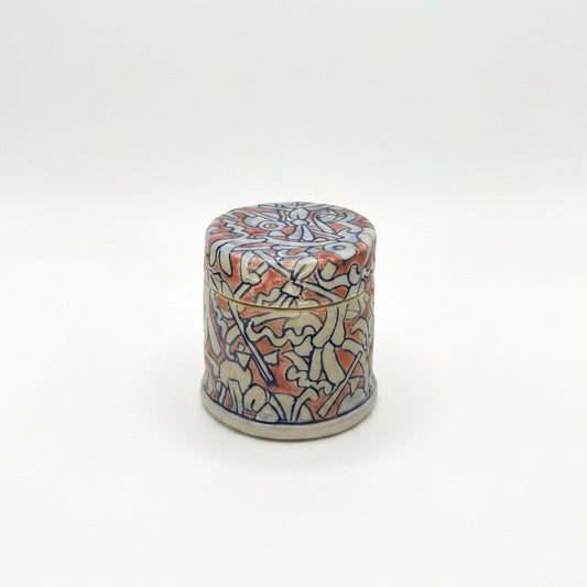 Small Red, White, and Blue Lidded Container