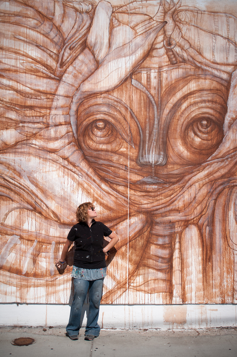 Gloria Muriel in front of mural at Bread and Salt, San Diego. Photo credit Alex H. Banach