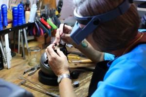 Susan Ronan setting the sapphires on the neckpiece "Luna" for Allied Craftsman 2016