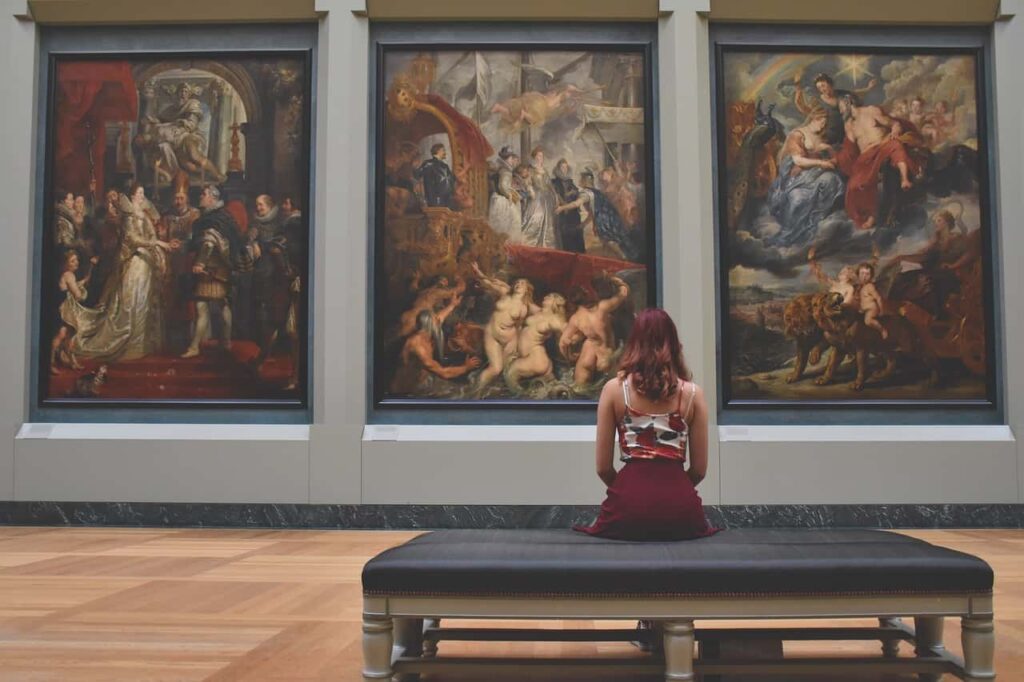 A person enjoying an art gallery